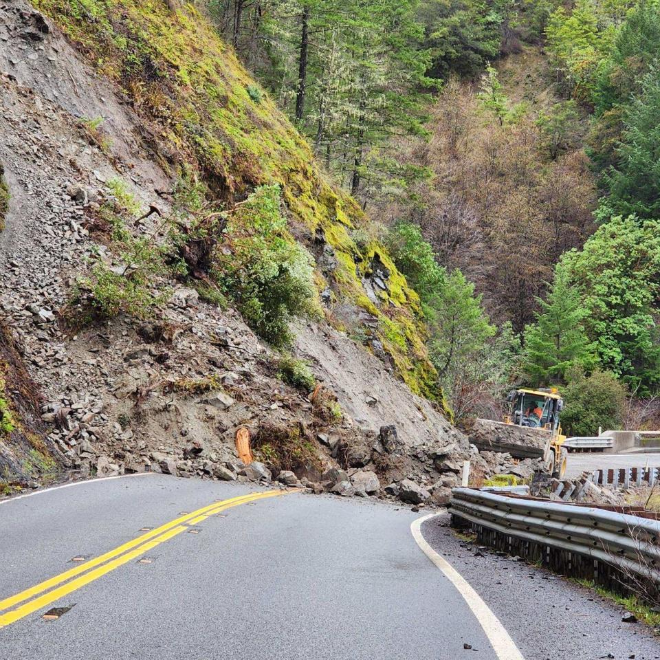Cars can only travel in one lane after a mudslide on Burnt Ranch and Hawkins Bar off Highway 299 on Saturday, Dec. 31, 2022.