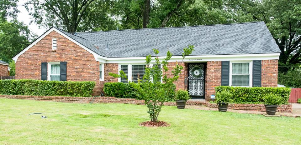 Front elevation - The one-story, traditional brick house was built in 1958 and comprises approximately 1,600 square feet