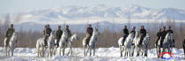 This undated photo provided on Wednesday, Dec. 4, 2019, by the North Korean government shows North Korean leader Kim Jong Un, center, riding on a white horse during his visit to Mount Paektu, North Korea. North Korea says leader Kim has taken a second ride on a white horse to a sacred mountain in less than two months. Independent journalists were not given access to cover the event depicted in this image distributed by the North Korean government. The content of this image is as provided and cannot be independently verified. Korean language watermark on image as provided by source reads: "KCNA" which is the abbreviation for Korean Central News Agency. (Korean Central News Agency/Korea News Service via AP)