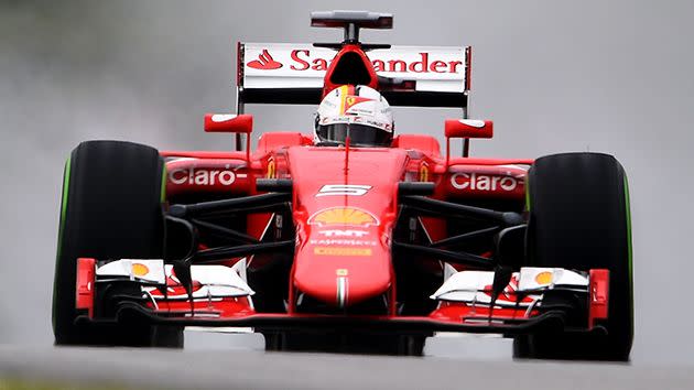 Vettel and the famous Ferrari. Pic: Getty