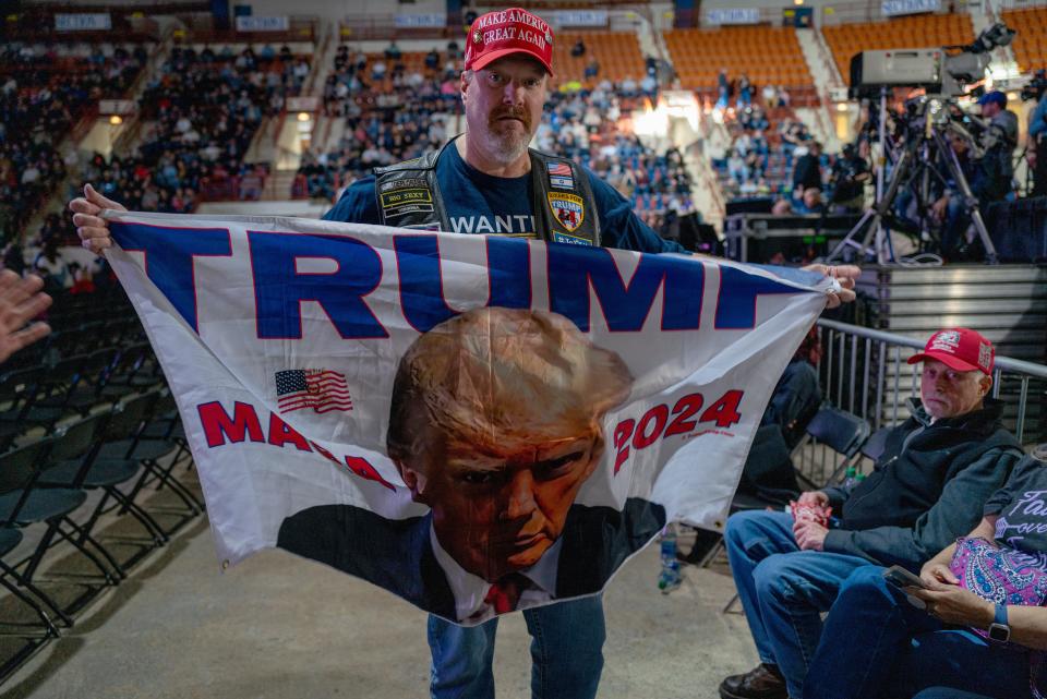 Supporters of former President Donald Trump wait to hear him speak at an NRA forum on Feb. 09, 2024, in Harrisburg, Pa.