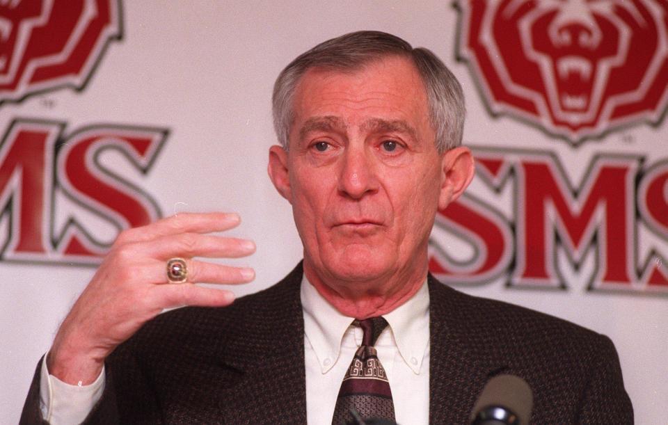 Bill Rowe, former MSU director of athletics, announces coach Steve Alford's departure from SMSU for Iowa in 1999.