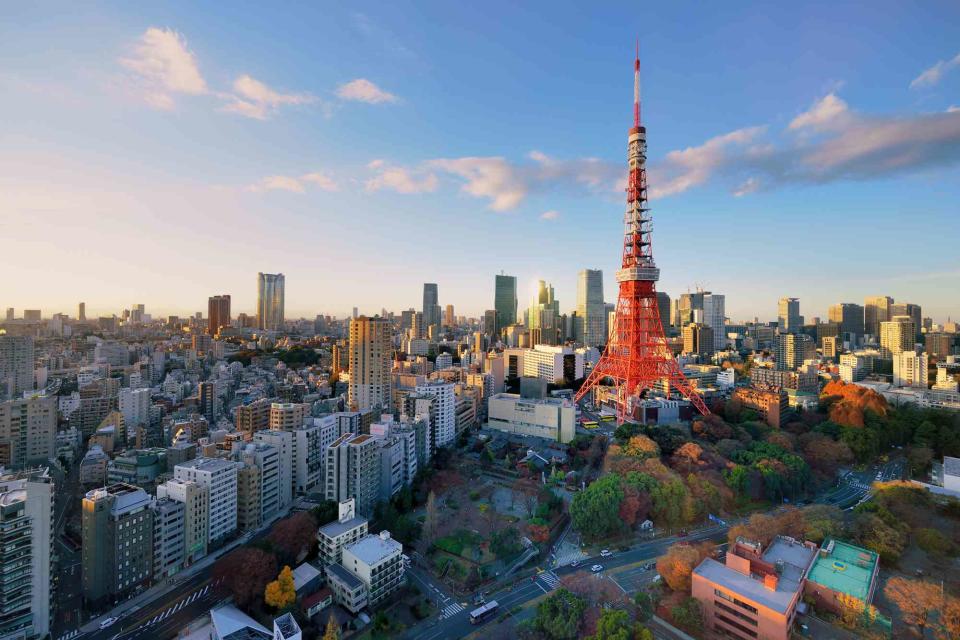 <p>vladimir zakharov/Getty Images</p> A view of central Tokyo, including the Azabu district and the landmark Tokyo Tower.