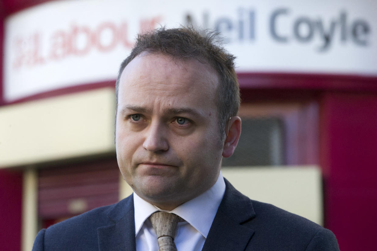 British Labour Party member of parliament (MP) Neil Coyle speaks to the media outside his constituency office in London on December 4, 2015. The politician reported top the police alleged abusive and threatening messages that were sent to him because he supported the Syrian bombing campaign in a parliamentary vote. AFP PHOTO / JUSTIN TALLIS (Photo by Justin TALLIS / AFP) (Photo by JUSTIN TALLIS/AFP via Getty Images)