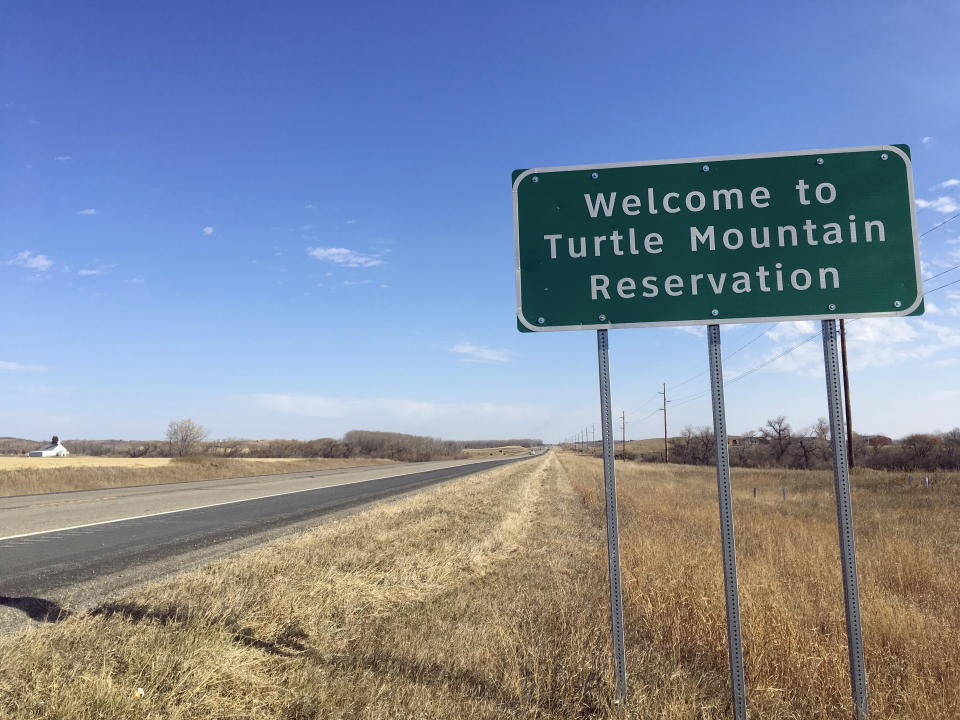 In this Wednesday, Oct. 24, 2018, photo, Native Americans in North Dakota including those on the remote Turtle Mountain Indian Reservation face a hurdle in getting identification with street addresses that will enable them to vote under recently tightened state rules. (AP Photo/Blake Nicholson)