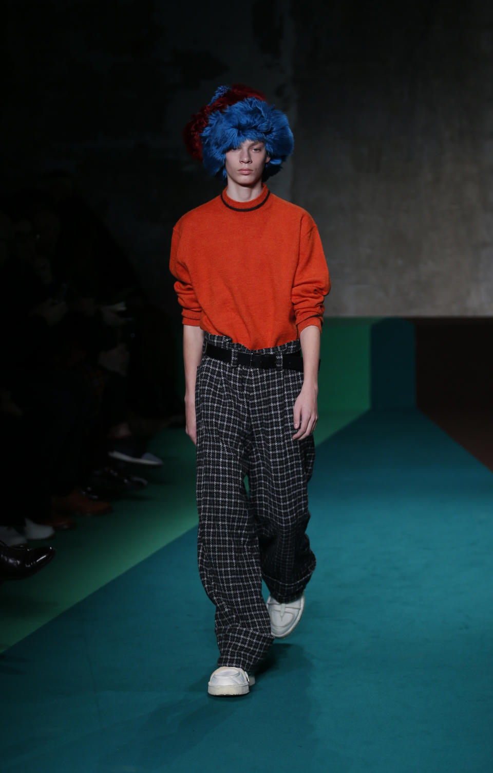 A model wears a creation for the Marni men's Fall-Winter 2017-2018 collection, part of the Milan Fashion Week, unveiled in Milan, Italy, Saturday, Jan. 14, 2017. (AP Photo/Antonio Calanni)