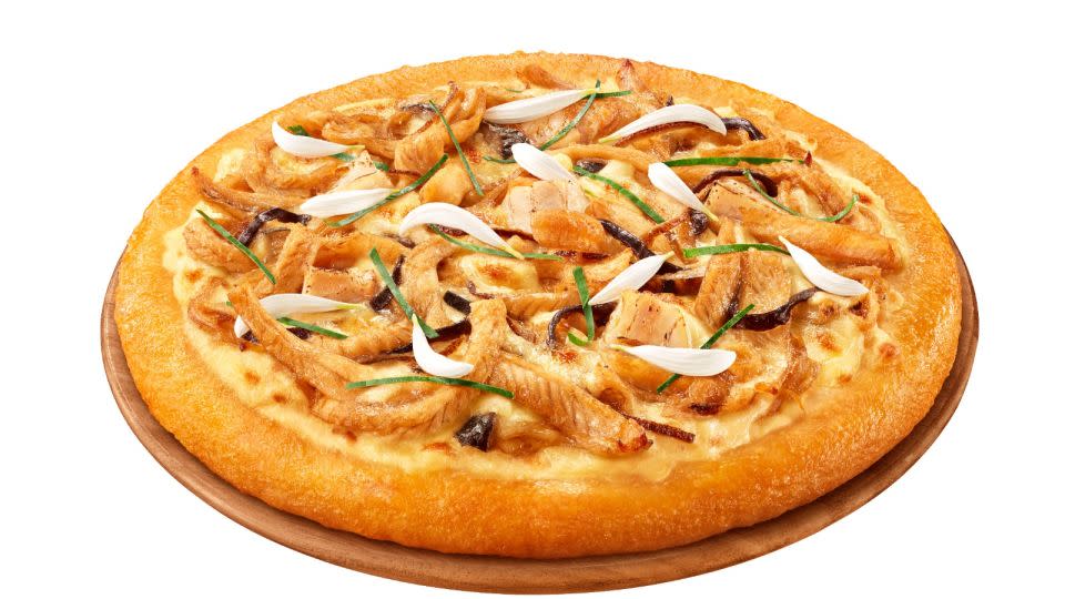 Hong Kong's Pizza Hut is partnering up with a local century-old restaurant to introduce a new snake-soup pizza. - Pizza Hut