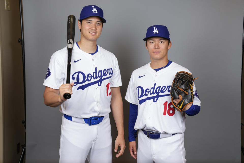 Shohei Otani and Yoshinobu Yamamoto's uniforms shouldn't be so transparent.  (AP Photo/Ashley Landis)