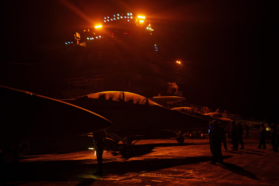 Fighter jets are stationed on the flight deck of the USS Dwight D. Eisenhower during a deployment in the Red Sea on Tuesday, June 11, 2024. (AP Photo/Bernat Armangue)