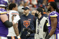 Chicago Bears head coach Matt Nagy, center, walks off the field after an NFL football game against the Minnesota Vikings, Sunday, Jan. 9, 2022, in Minneapolis. The Vikings won 31-17. (AP Photo/Bruce Kluckhohn)