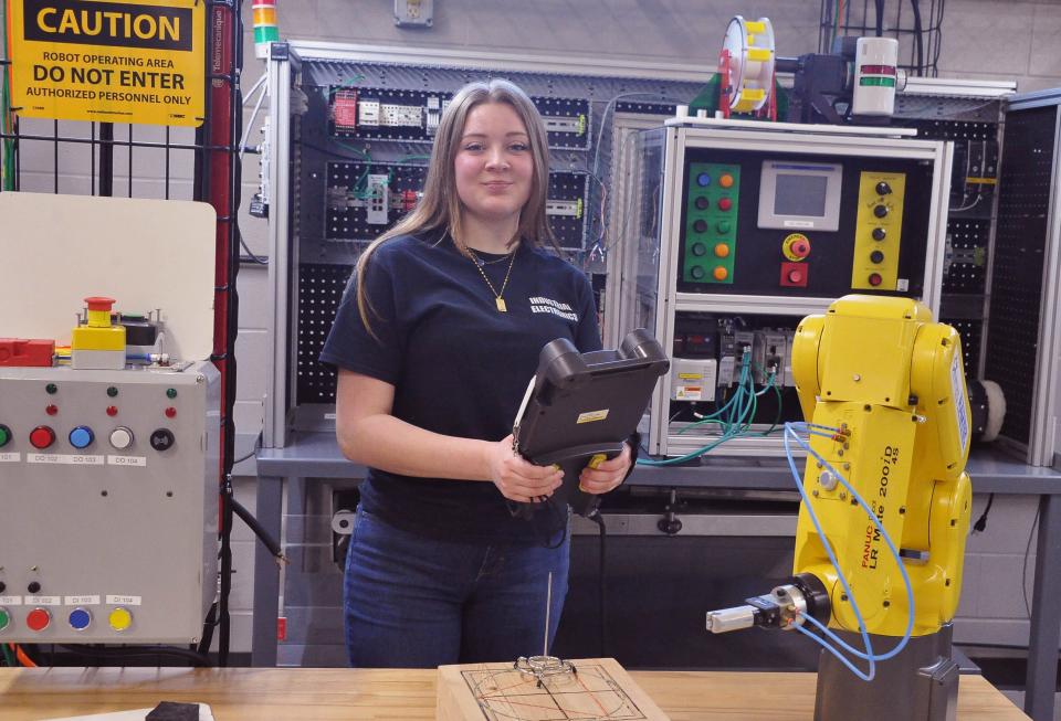 Kiersten Skelly is ready to program a Franc Robot at the Career Center. She is studying industrial electronics and robotics and automation programs. She plans on a long-term career at Schaeffler in Wooster.