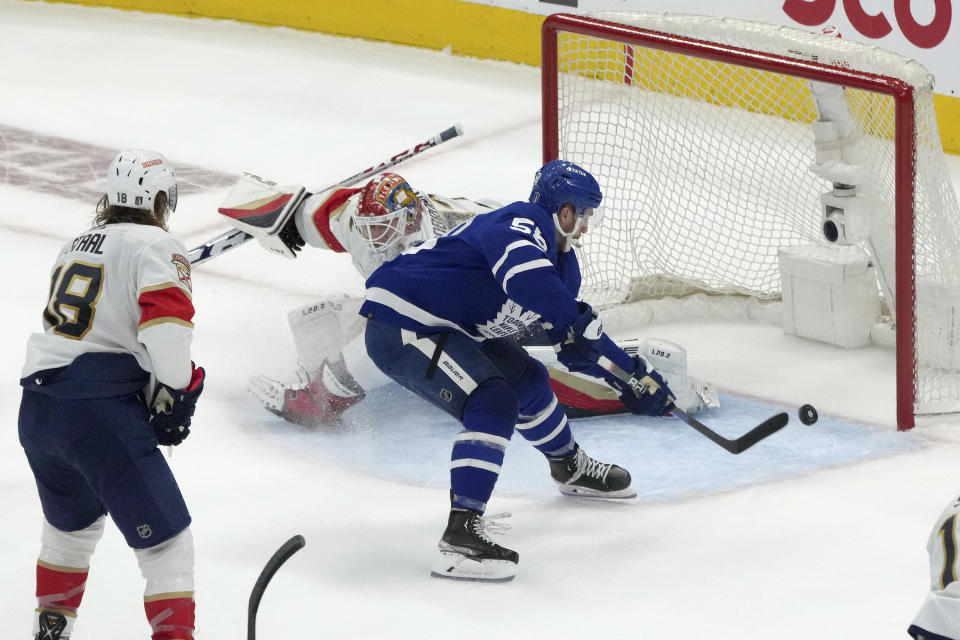 Toronto Maple Leafs left wing Michael Bunting (58) scores on Florida Panthers goaltender Sergei Bobrovsky (72) during the second period of Game 1 of an NHL hockey Stanley Cup second-round playoff series in Toronto, Tuesday, May 2, 2023. (Chris Young/The Canadian Press via AP)