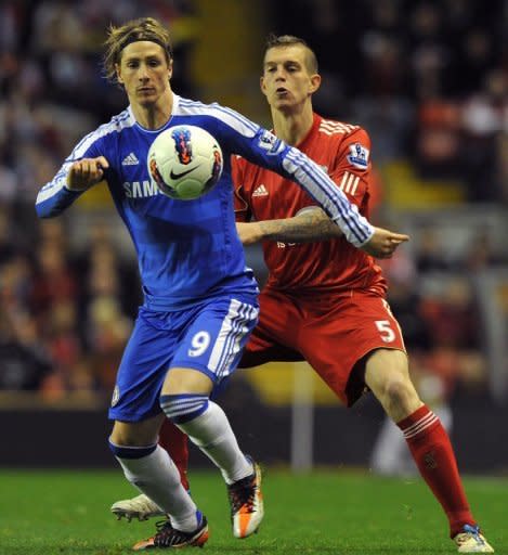 File picture shows Liverpool's Daniel Agger challenging Spanish striker Fernando Torres. Chelsea's Spanish forward Fernando Torres (L) vies with Liverpool's Danish defender Daniel Agger during a Premier League football match at Anfield in May. Liverpool won that match 4-1