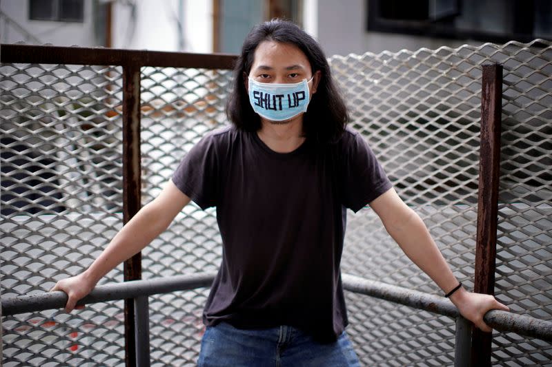 Brother Nut, Chinese performance artist, poses for a picture in Shanghai