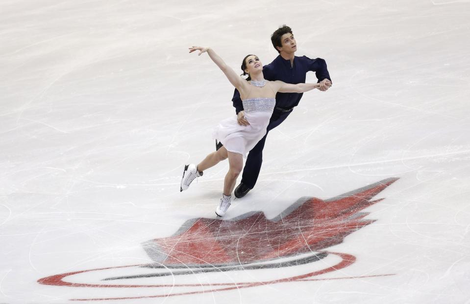 Tessa Virtue, 24, of London, Ontario and Scott Moir, 26, of Ilderton, Ontario. Canada's heralded ice dance team of Virtue and Moir will try to add one more gold medal to their mantle, before retiring at the conclusion of the Games. In their way stands longtime American rivals, Meryl Davis and Charlie White.