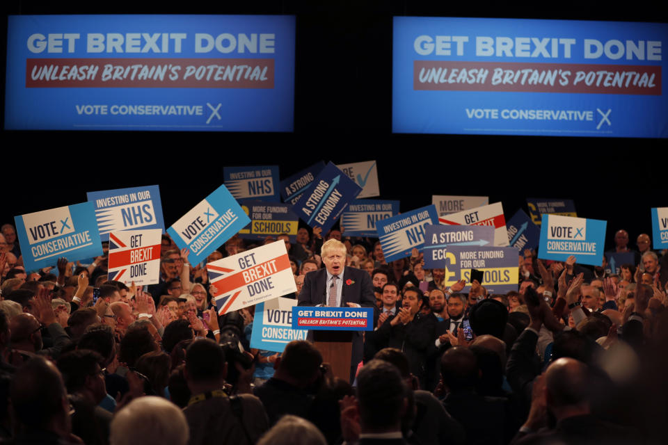 Britain's Prime Minister Boris Johnson speaks during an election campaign event for his ruling Conservative Party at the NEC, (National Exhibition Centre) in Birmingham, England, Wednesday, Nov. 6, 2019. Britain goes to the polls on Dec. 12. (AP Photo/Frank Augstein)