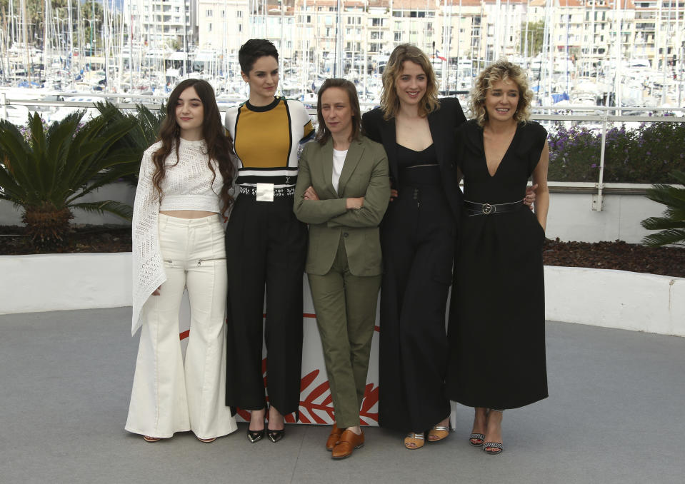 Actresses Luana Bajrami, from left, Noemie Merlant, director Celine Sciamma, actresses Adele Haenel and Valeria Golino pose for photographers at the photo call for the film 'Portrait of a Lady on Fire' at the 72nd international film festival, Cannes, southern France, Monday, May 20, 2019. (Photo by Joel C Ryan/Invision/AP)