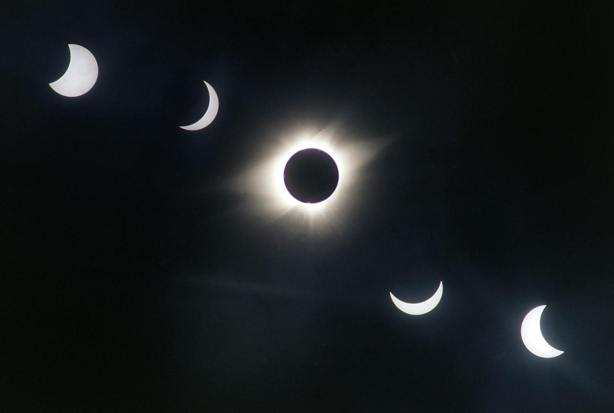 1991: A multiple-exposure photograph shows the progress of a solar eclipse over Xochicalco, Mexico.