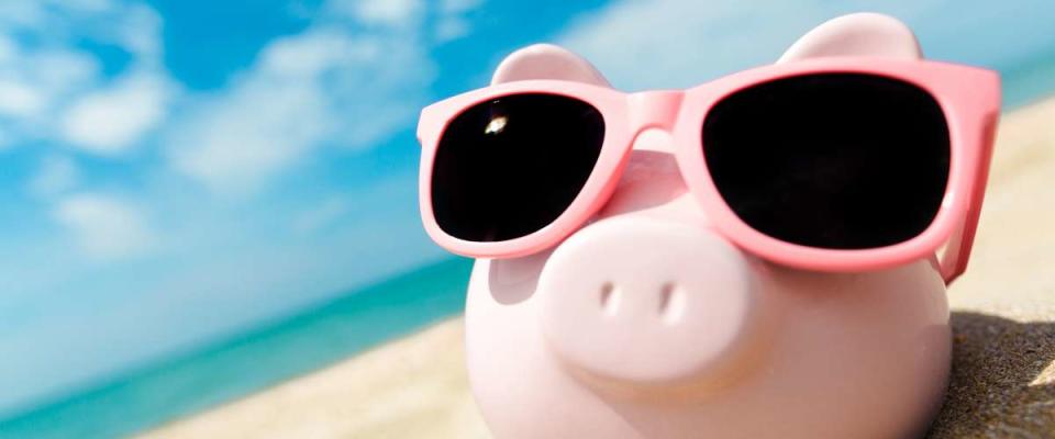 piggy bank on the beach