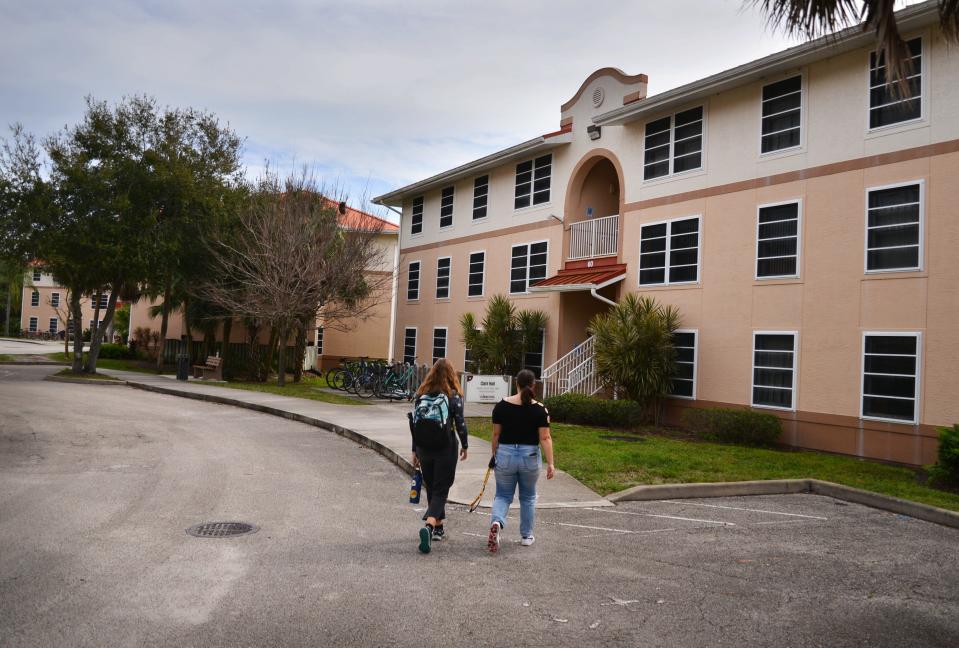 Students head back to their dorms in Florida Tech's Columbia Village.
