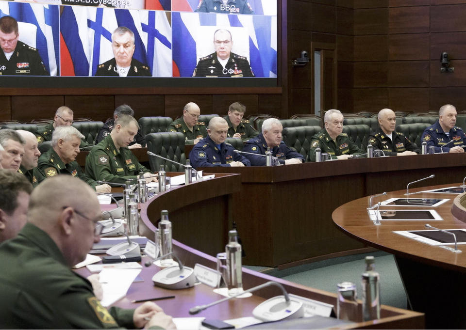 In this handout photo released by Russian Defense Ministry Press Service, Russian high level officers listen to Defense Minister Sergei Shoigu during a meeting in Moscow, Russia, Friday, April 14, 2023. Shoigu announced that the entire Russian Pacific Fleet was put on high alert on Friday for snap drills that will involve practice missile launches in a massive show of force amid the tensions with the West over the fighting in Ukraine. (Russian Defense Ministry Press Service via AP)