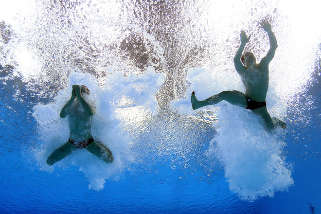 LONDON, ENGLAND - FEBRUARY 20: Alexandre Despatie and Reuben Ross of Canada in action during the Men's 3m Springboard Synchro Final at the Aquatics Centre on February 20, 2012 in London, England. (Photo by Clive Rose/Getty Images)