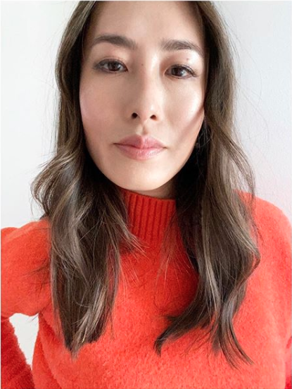 Melissa Leong wearing an orange jumper