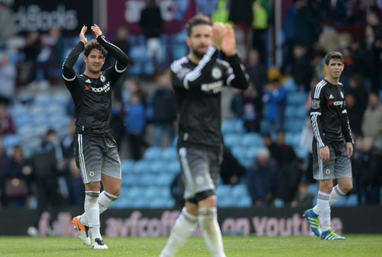 Chelsea's striker Alexandre Pato (L) applauds fans after the English Premier League football match between Aston Villa and Chelsea at Villa Park in Birmingham, central England on April 2, 2016