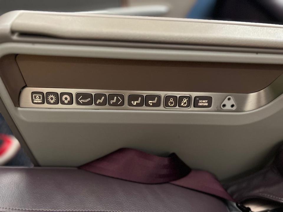The control panel on the A350 business class seat, which could create a cradle position, but not fully lie flat.
