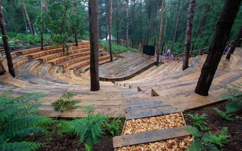 The auditorium of Thorington Outdoor Theater is hidden among the woods