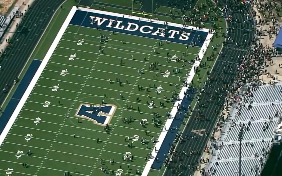 Students were evacuated to the football stadium after the school campus was placed on lockdown