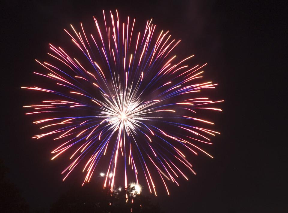 Fireworks explode over Bleecker Street in Utica.