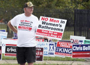 FILE - A man urges people to vote against the Houston Equal Rights Ordinance outside an early voting center in Houston on Wednesday, Oct. 21, 2015. (AP Photo/Pat Sullivan, File)