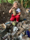 A seven-year-old schoolgirl is raking in hundreds of pounds by selling antique bottles from a little shop in her back garden - after digging them up from old landfill sites. Betsy-Mae Lloyd has been coining it in after launching her own business at her parents' home while still attending primary school. The young entrepreneur flogs old bottles, jars and teapots - dating back to between the 1870s and 1930 - which she finds on historic landfill sites in the West Midlands. After taking them home and cleaning them up herself, she then stores them in a Victorian-style play shed, built by dad Jason, before listing them for sale on Facebook. 