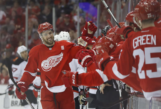 Detroit Red Wings center Riley Sheahan (15) celebrates his goal against the New Jersey Devils during the first period of the final NHL hockey game at Joe Louis Arena, Sunday, April 9, 2017, in Detroit. (AP Photo/Paul Sancya)