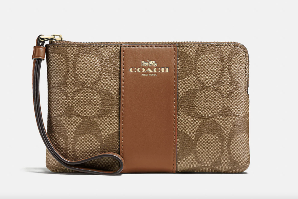 Corner Zip Wristlet in brown leather cc print (Photo via Coach Outlet)