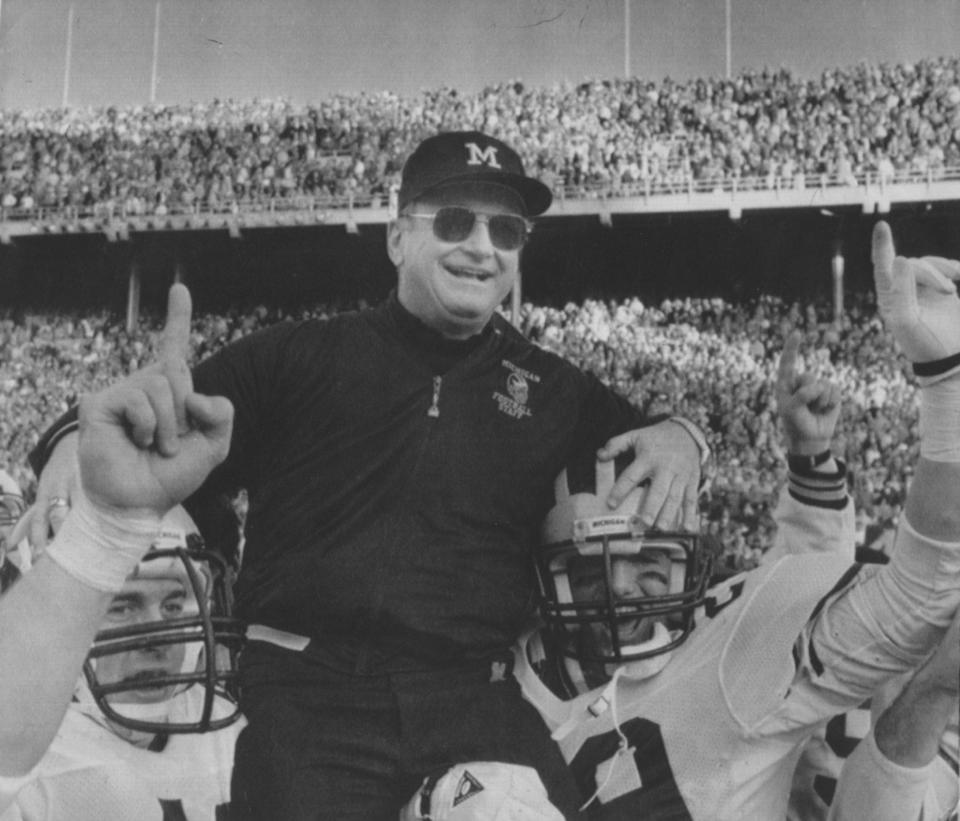 Michigan coach Bo Schembechler is carried from the field Saturday, November 22, 1986 after a 26-24 victory over Ohio State for the Big Ten title. The moment came 17 years to the day after he first beat the Buckeyes in one of the greatest upsets in college football history.