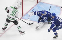 Dallas Stars center Tyler Seguin (91) is stopped by Tampa Bay Lightning goaltender Andrei Vasilevskiy (88) as Lightning defenseman Erik Cernak (81) defends during second-period NHL Stanley Cup finals hockey action in Edmonton, Alberta, Saturday, Sept. 19, 2020. (Jason Franson/The Canadian Press via AP)