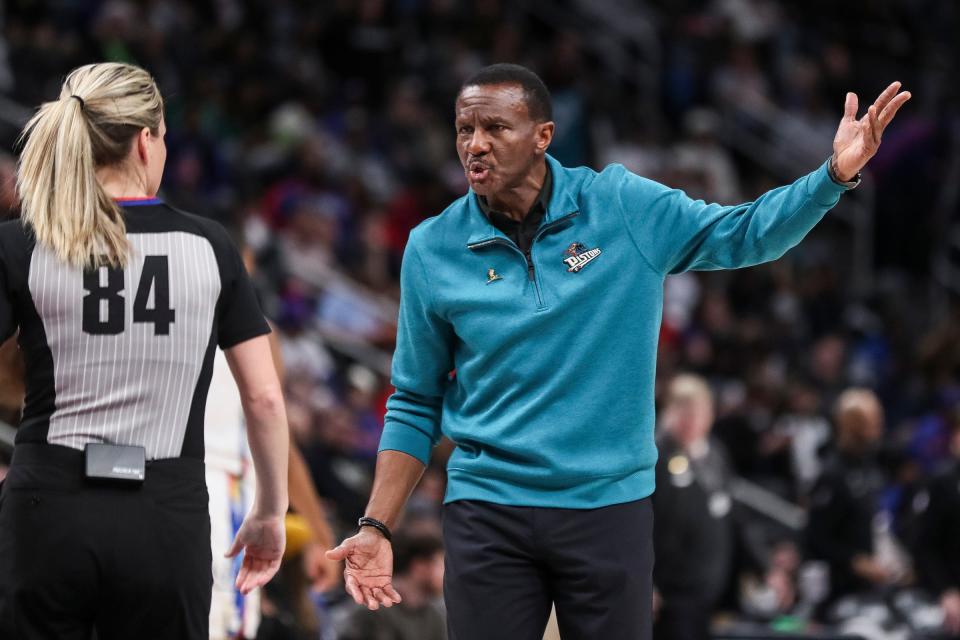 Detroit Pistons head coach Dwane Casey talks to a referee at a timeout during the second half against the Brooklyn Nets at Little Caesars Arena in Detroit on Wednesday,  April 5, 2023.