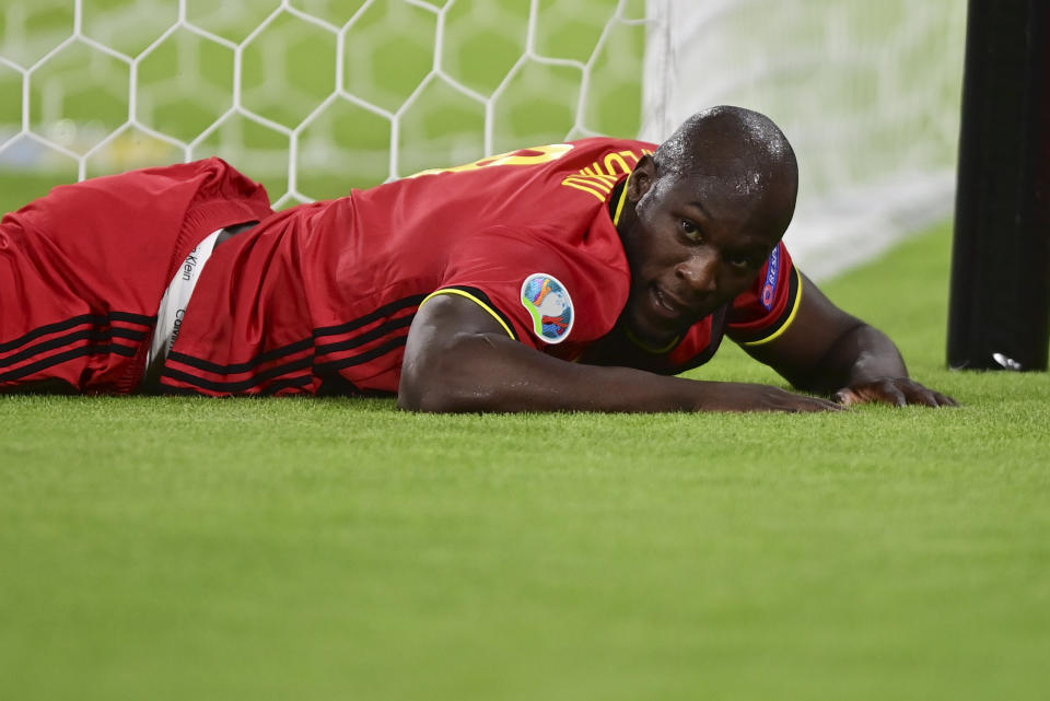 Belgium's Romelu Lukaku reacts after missing a scoring chance during the Euro 2020 soccer championship quarterfinal match between Belgium and Italy at at the Allianz Arena in Munich, Germany, Friday, July 2, 2021. (AP Photo/Philipp Guelland, Pool Photo via AP)