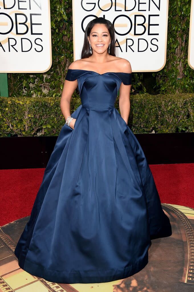 <p>Wearing a Zac Posen dress with Neil Lane diamonds and Jimmy Choo shoes, the <i>Jane the Virgin</i> actress, nominated for her role for the second year in a row (with the show only in its second season!), brought her dad as her date. </p>