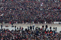 Crowds wait for the start of the presidential inauguration on the West Front of the U.S. Capitol January 21, 2013 in Washington, DC. Barack Obama was re-elected for a second term as President of the United States. (Photo by John Moore/Getty Images)