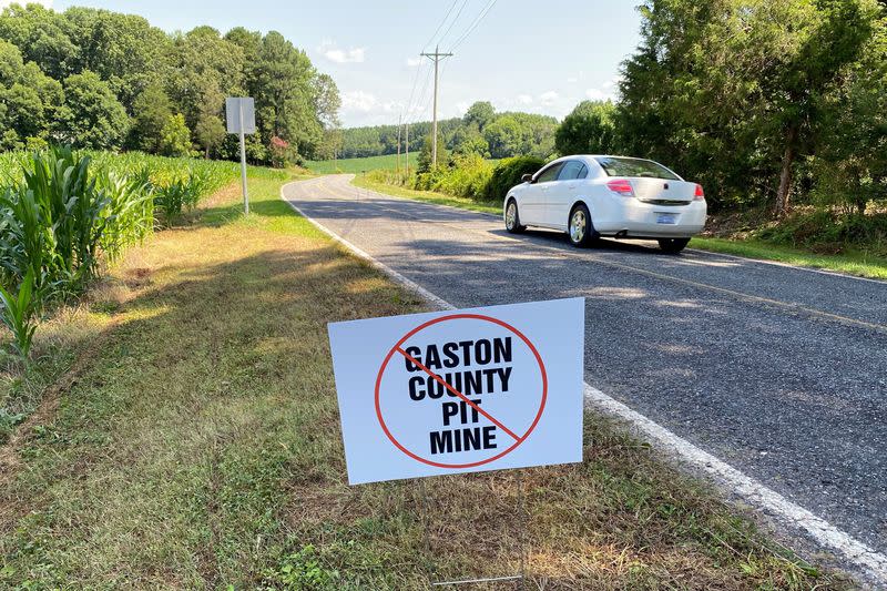 FILE PHOTO: A sign planted by opponents of the Piedmont Lithium's planned mine is seen on a roadside in Gaston County
