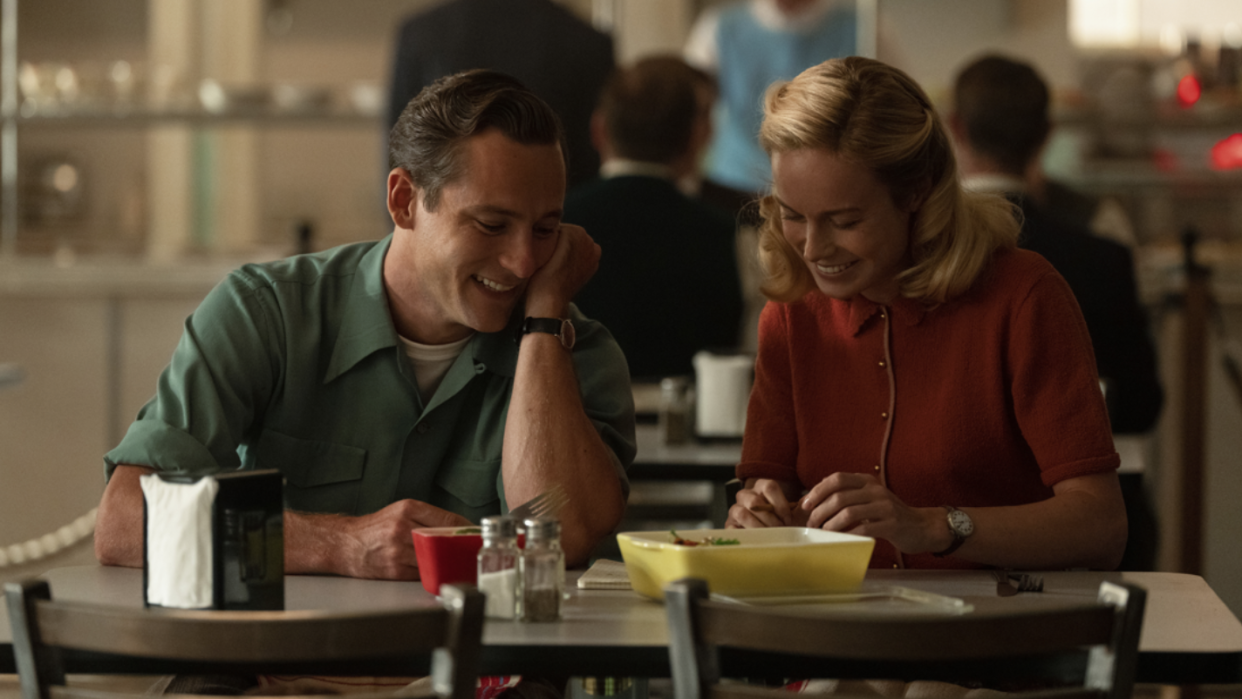 a man and a woman sitting at a table