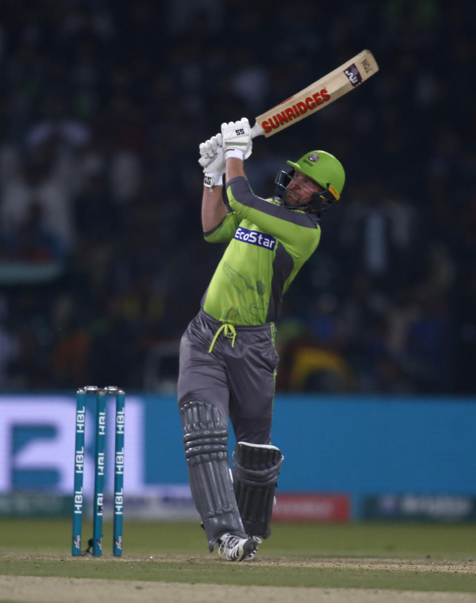 Lahore Qalandars batsman Ben Dunk plays a shot for boundary during a Pakistan Super League T20 cricket match against Karachi Kings, in Lahore, Pakistan, Sunday, March 8, 2020.(AP Photo/K.M. Chaudary)