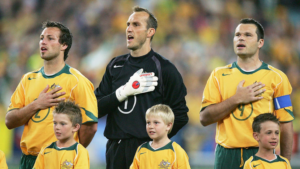 Pictured right, Lucas Neill became Socceroos captain after Mark Viduka retired.