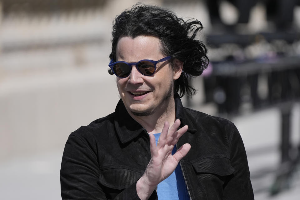 Musician Jack White waves before being honored by the Michigan Central Station, Thursday, June 6, 2024, in Detroit. (AP Photo/Carlos Osorio)