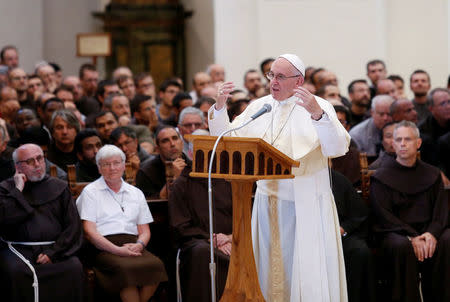 FILE PHOTO: Pope Francis speaks outside the Porziuncola, the chapel inside the Saint Mary of Angels Basilica, in the pilgrimage town of Assisi, central Italy, August 4, 2016. REUTERS/Remo Casilli/File Photo