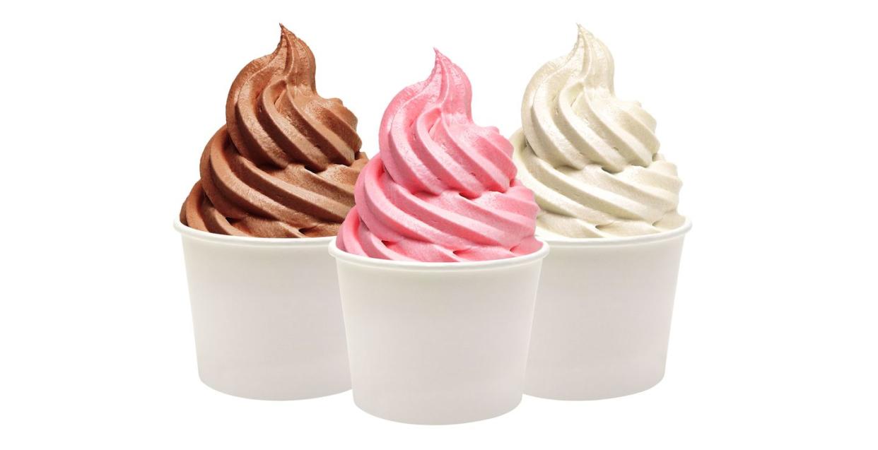 blank paper cups with frozen yogurt on white background