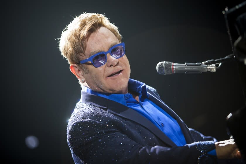 LOS ANGELES, CA.-- OCTOBER 4, 2014--Elton John performs with his band to a sold-out crowd at the Staples Center, at part of the "All The Hits" tour, Oct. 4, 2014. (Jay L. Clendenin / Los Angeles Times)